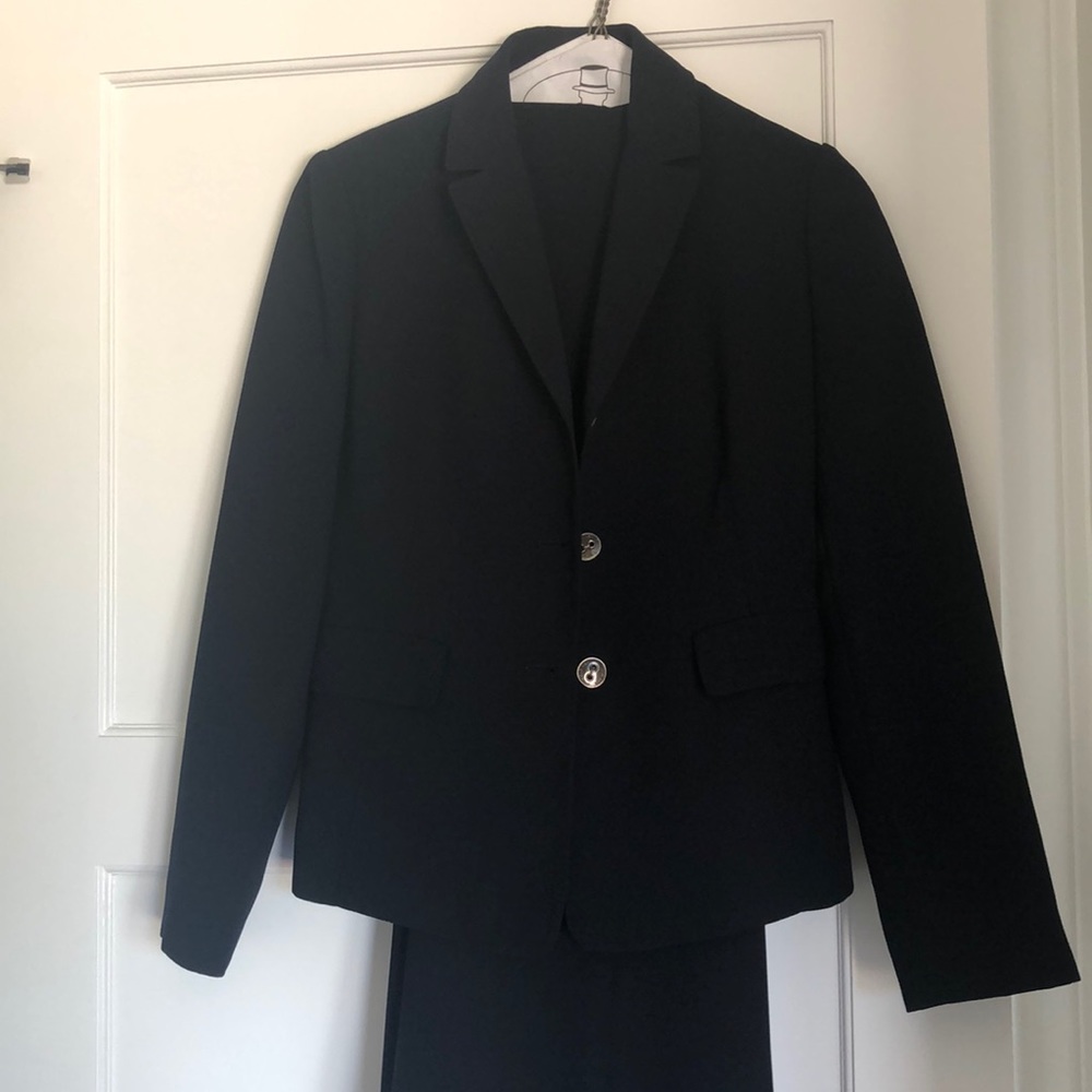Calvin Klein dark blue business suit.